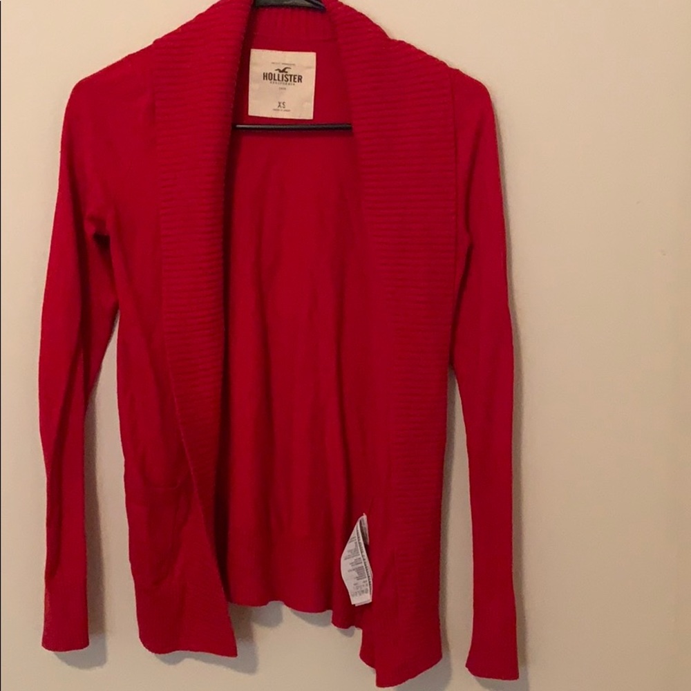Red cardigan.